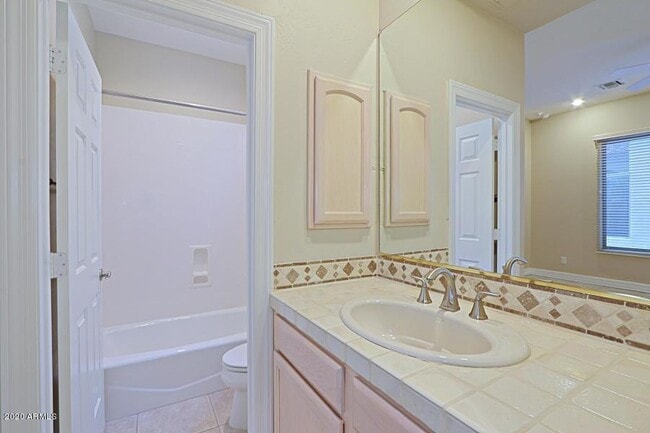 Building Photo - 9311 E Cavalry Dr