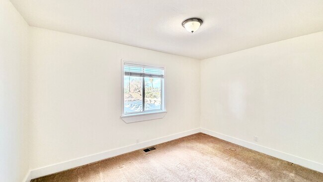 Building Photo - Beautiful Craftsman-style Home with fenced yard space, detached garage and additional parking in ...