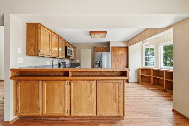 Building Photo - $2,845.95- 4-Bed /3-Bath Gem with Finished Basement and Fenced-in Yard in Colorado Springs!