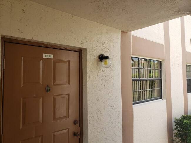 Building Photo - 12252 Royal Palm Blvd