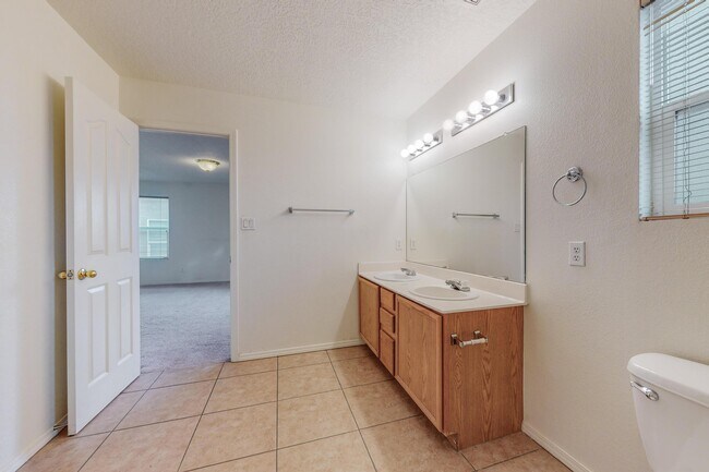 Building Photo - 6056 Malpais Park Ave NW