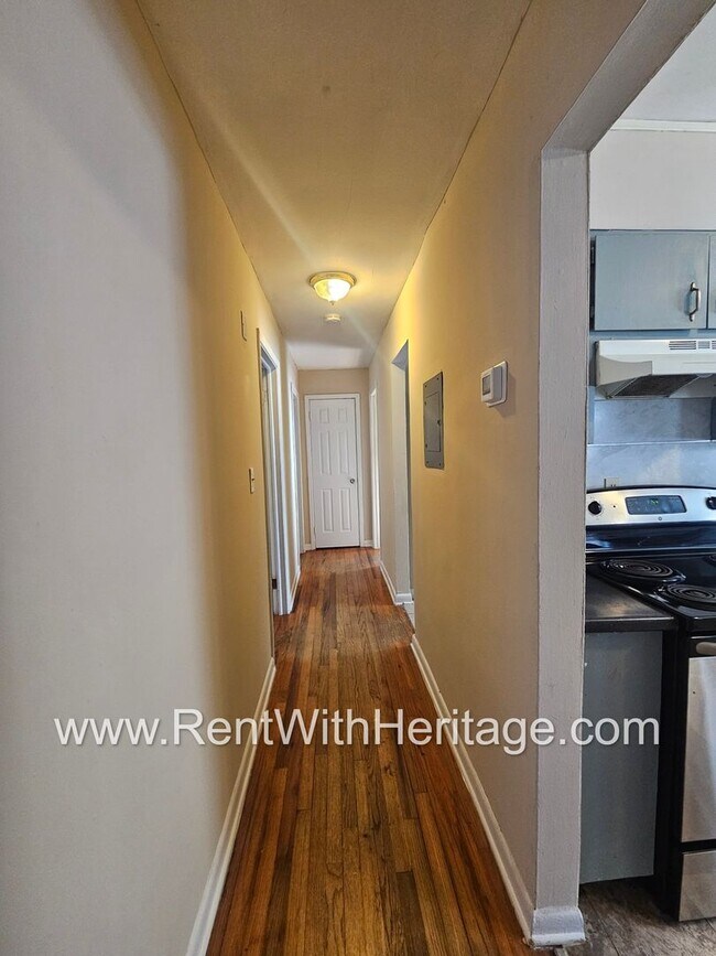 Building Photo - Great Brick Ranch / Harwood Floors / Huge Shop or Extra Storage / No Garage / Great Private Back ...