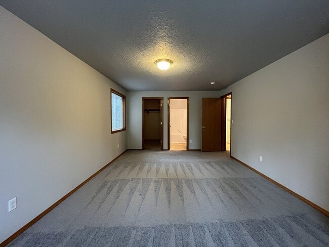 Building Photo - 3-Bed Home with Fireplace, Fenced Backyard, 2 Car Garage & Front Patio!