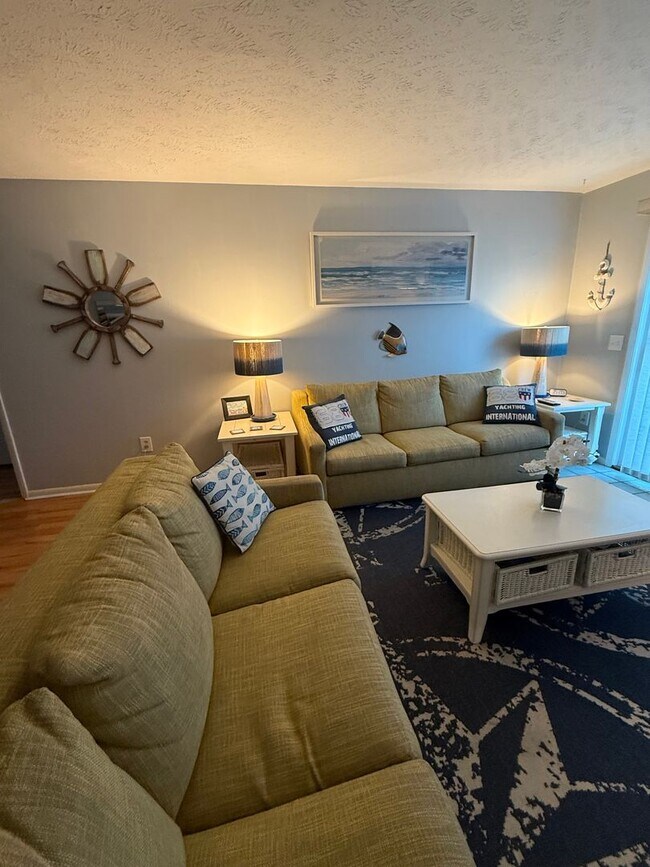 Building Photo - NEW OWNERS OF THIS FURNSIHED OFF-SEASON RE...