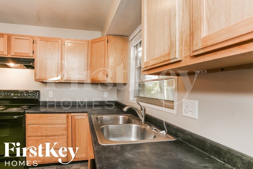 Building Photo - 5920 Schoolwood Dr