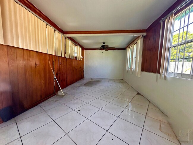 Building Photo - A charming home features 3 spacious bedroo...