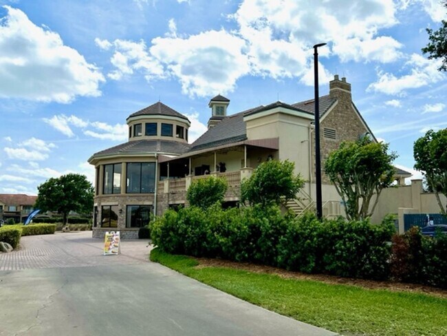 Building Photo - EAGLE CREEK LAKE NONA! WELCOME HOME! Beautiful water views! Spacious 2 story-3 bedroom 2.5 bath h...