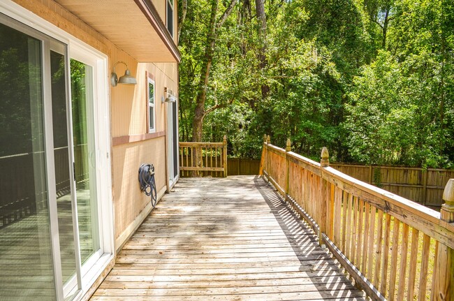 Building Photo - Check out this huge private fenced back yard at this Timberlane home!