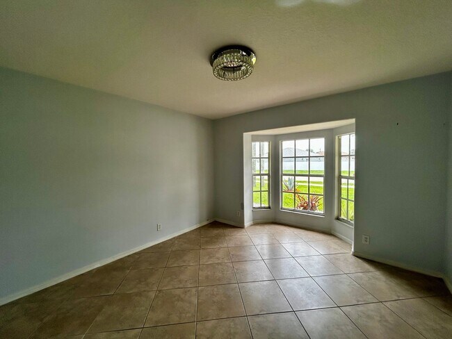 Building Photo - Western Port St. Lucie 3/2/2 with flex/roo...