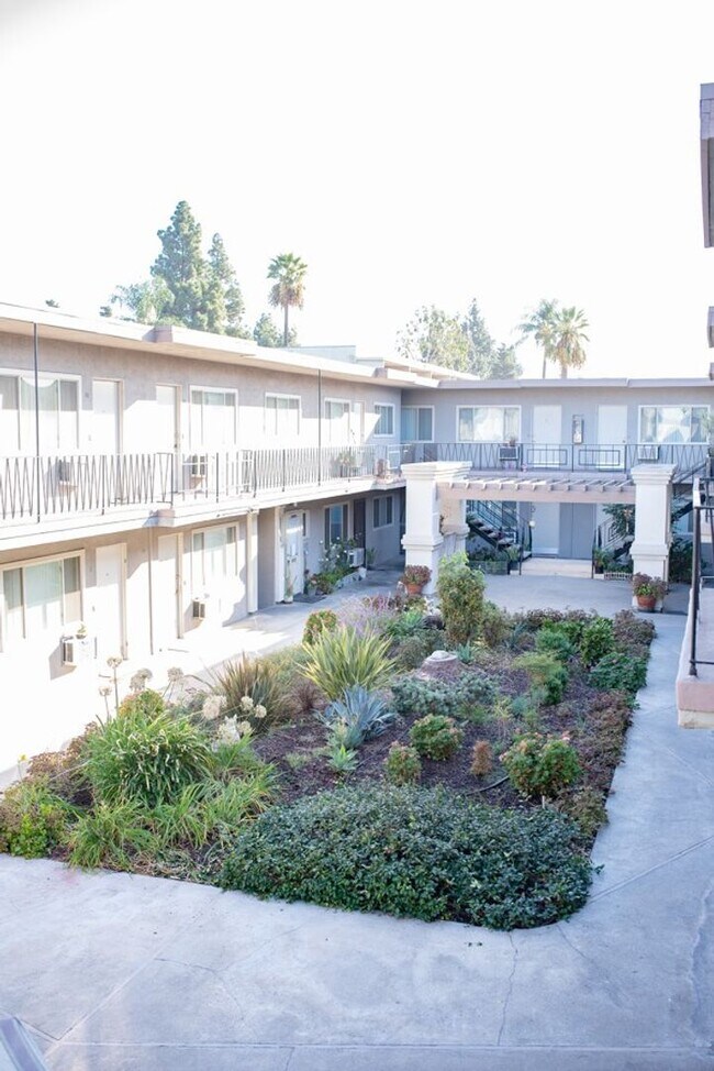 Building Photo - 1/2 OFF FIRST MONTH'S RENT studio with ALL UTILITIES PAID!