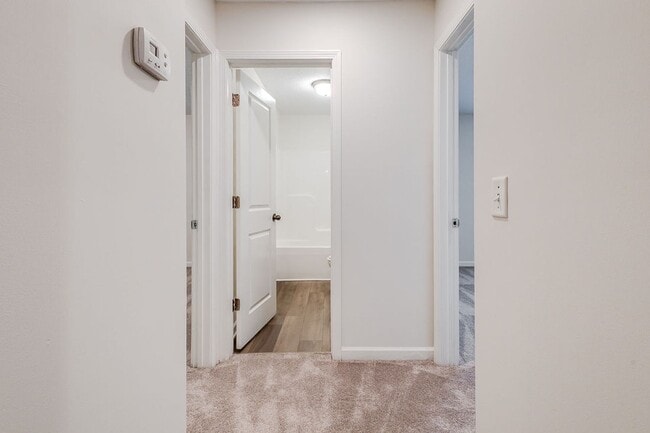 Building Photo - Spacious 3BR Townhome with Main-Level Primary Suite