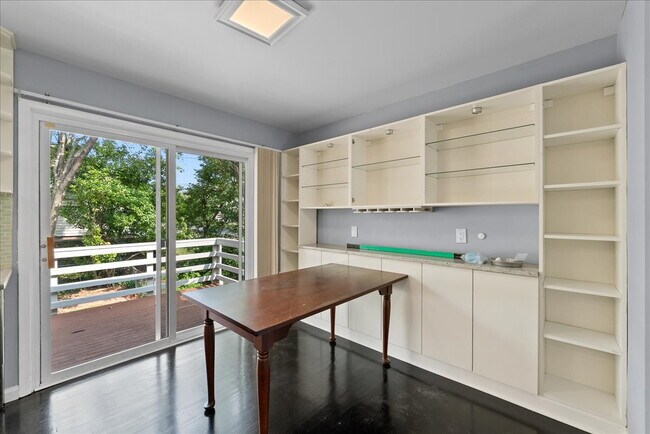 Building Photo - "Spacious 5-Bed Home with Granite Accents ...