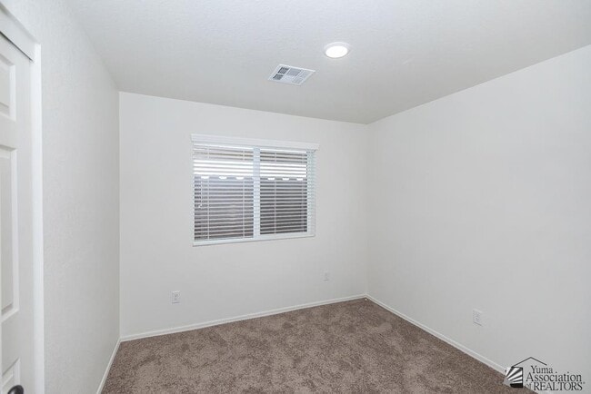 Building Photo - 7171 E 38th Ln