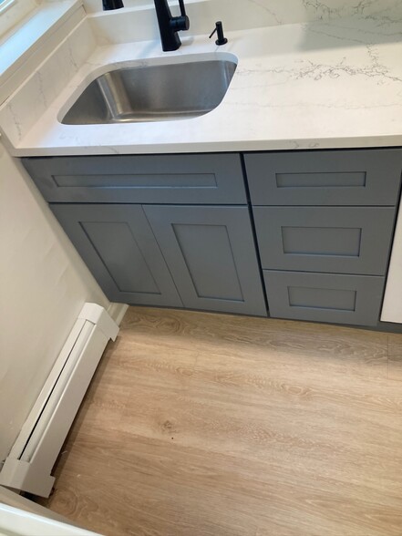 New kitchen flooring - 227 E Hector St