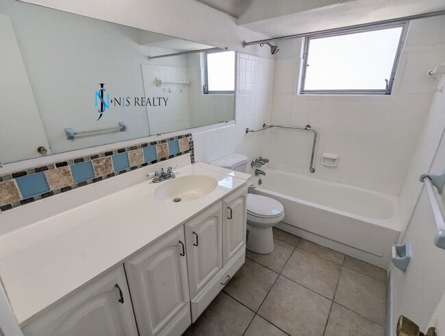 Building Photo - JUST REDUCED!!  Recently renovated 2/2/1 1...