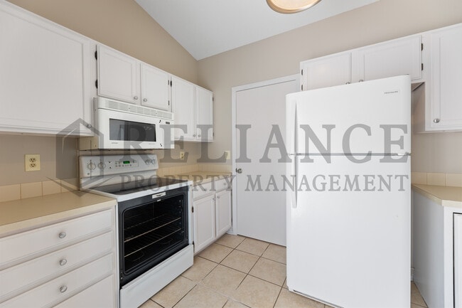 Building Photo - 6534 E 39th Ct N