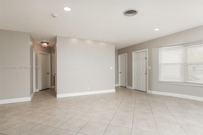 Building Photo - 6119 NW 18th Ct