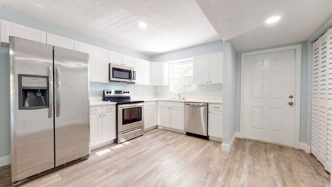 Building Photo - WAKE UP TO HILLSBOROUGH RIVER VIEWS IN THE HEART OF SEMINOLE HEIGHTS!