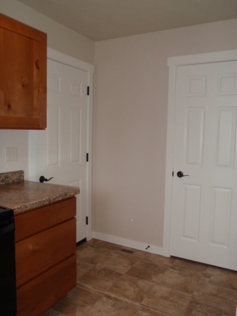 Building Photo - Newer house with attached garage. Half mon...