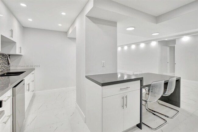 Building Photo - 9801 Collins Ave