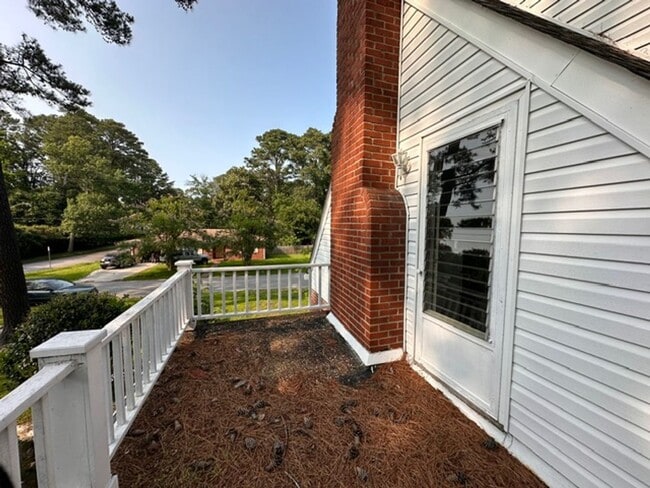 Building Photo - Charming Brick Cape Cope