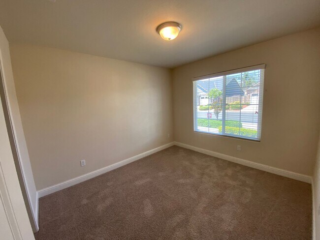 Building Photo - Immaculate like New Home in the gated Windmills at Tule Heights!