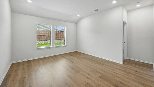 Building Photo - Beautiful new 4-bedroom, 2-bath home with an open floor plan, granite kitchen, two-car garage, an...