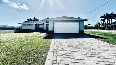 Building Photo - 4-bedroom 2-bath single-family - Cape Coral