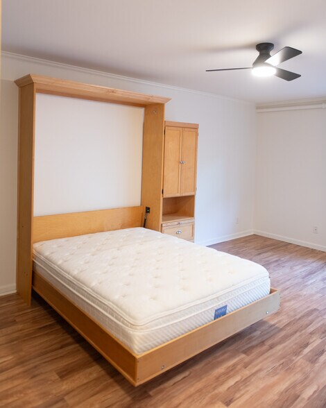 Main room with queen murphy bed open - 701 NE 28th Ave