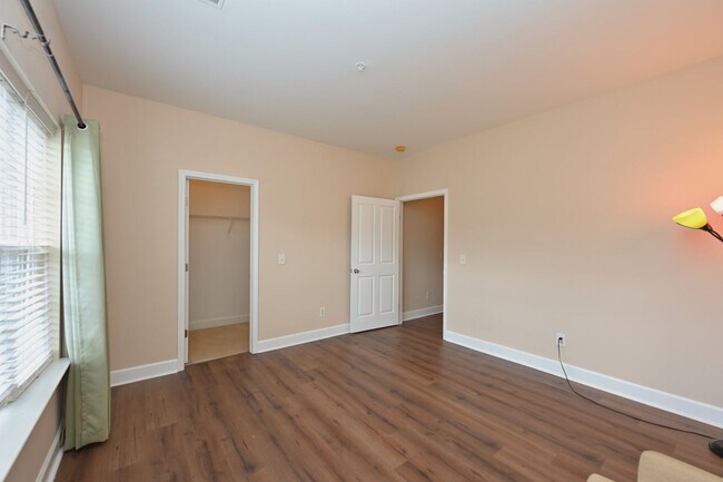 Building Photo - **PRISTINE GARDEN-LEVEL CONDO ON THE FIRST LEVEL NEAR PAVILION AND COMMUNITY GREEN SPACE**