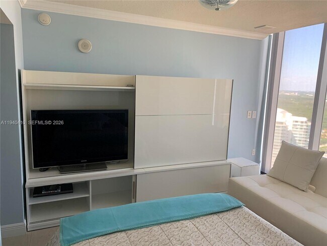 Building Photo - 16699 Collins Ave