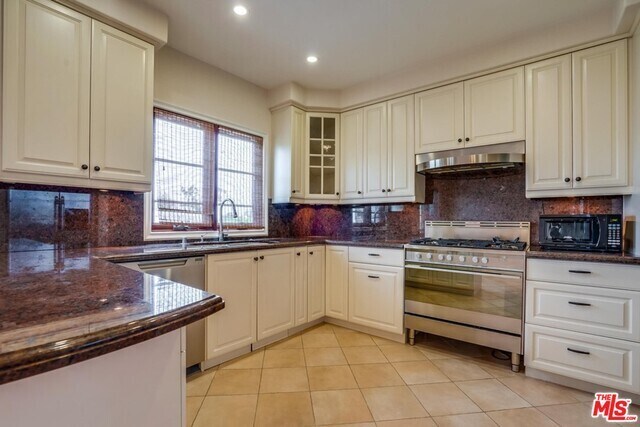 Building Photo - 10707 Missouri Ave