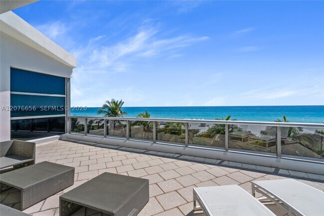 Building Photo - 5875 Collins Ave