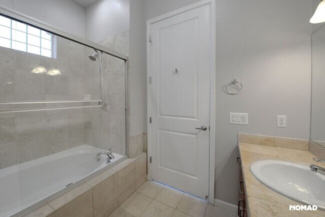 Building Photo - Two each: Bed, Bath, Parking, Storage Unit...