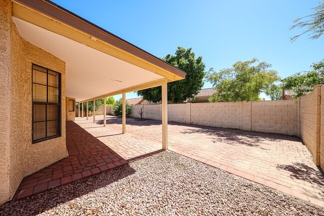 Building Photo - Welcome to this stunning 4-bedroom, 2-bath...