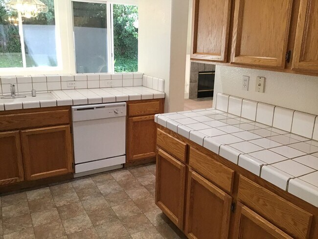 Building Photo - Three bedroom in gated community.