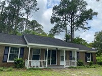 Building Photo - 4BR brick home with rocking chair porch, f...