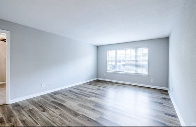 Building Photo - Spacious 2-Bedroom Elite Apartment with Private Balconies & Washer/Dryer