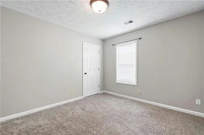Building Photo - Charming 3BR House in Woodstock