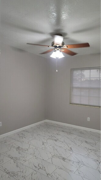 Building Photo - 7115 N Tampania Ave