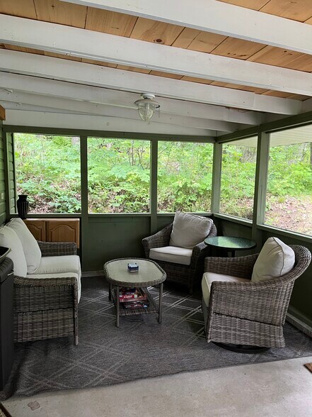 Screened porch seating - 948 Grant Lake Ln SW