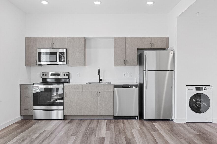 Building Photo - East Line Apartments - Live on Main Street...