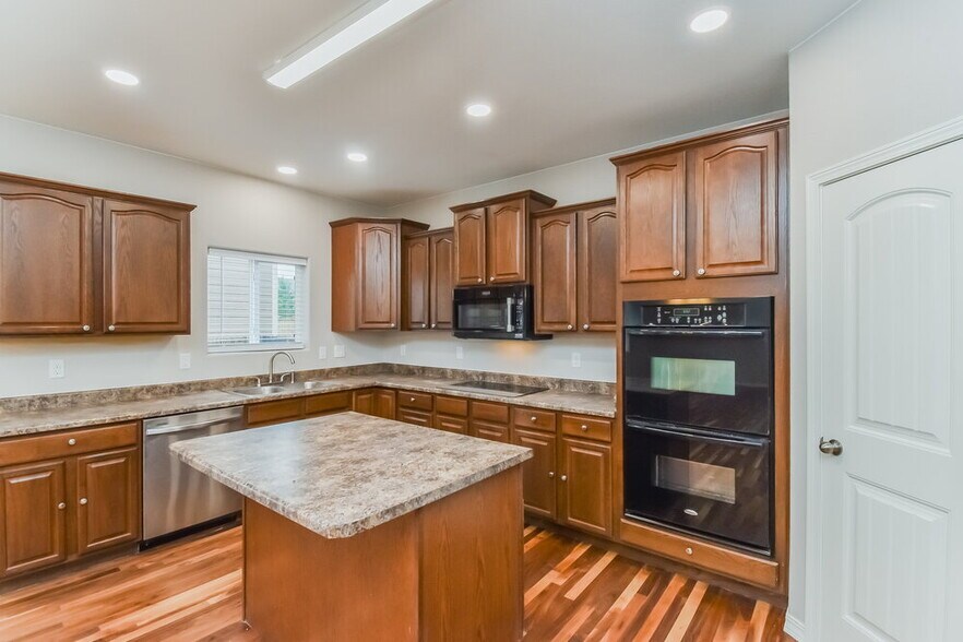 Building Photo - 7306 Running Deer Way