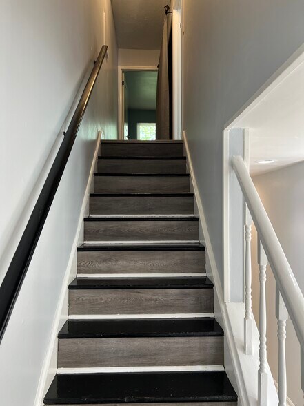 bottom of steps - 6419 Baker Ct