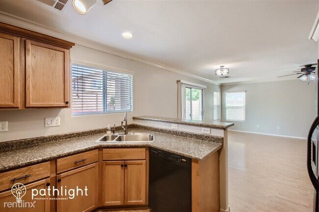 Building Photo - 4 br, 2 bath House - 22264 W Desert Bloom ...