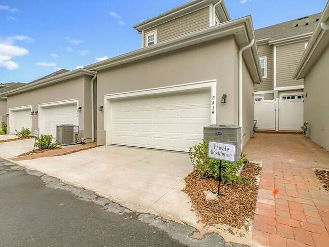 Building Photo - New Luxury Townhome in Celebration with All porcelain tiled floors. Island Village new construction