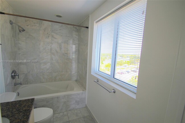 Building Photo - 6362 Collins Ave
