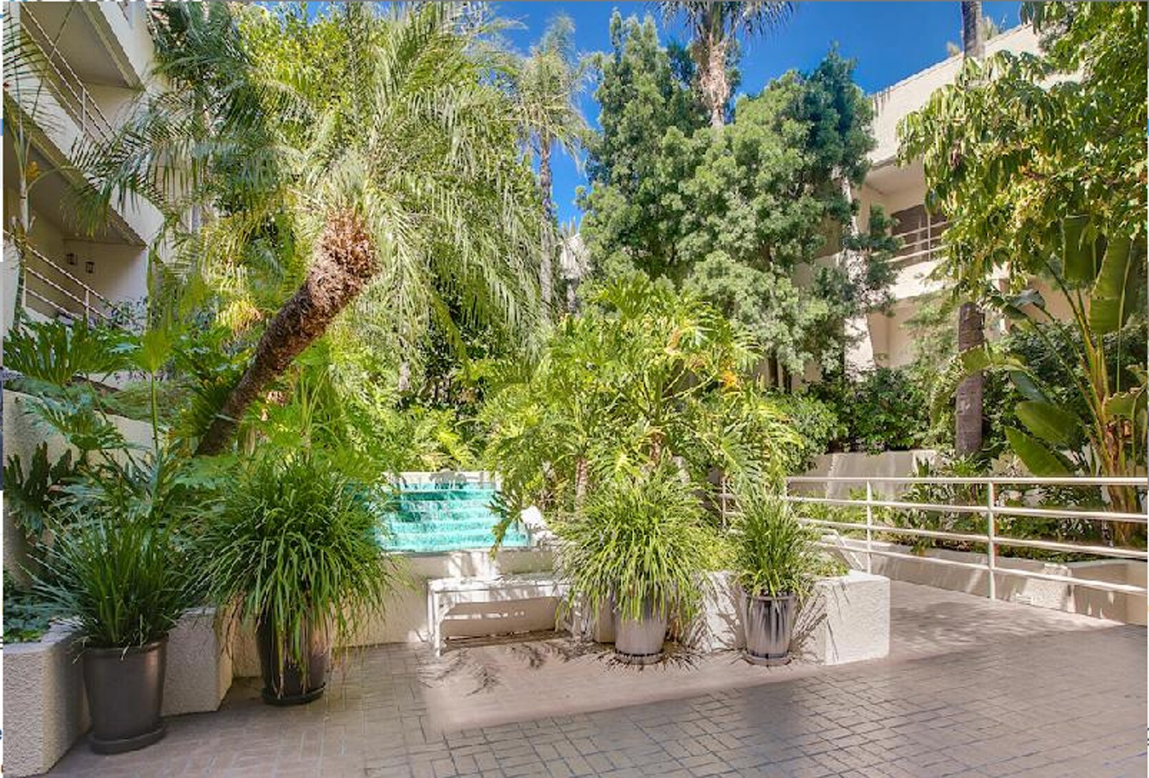 The garden path to the pool and rec area - 1131 Alta Loma Rd