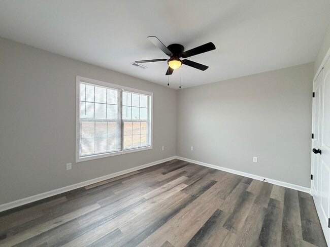 Building Photo - 7020 Caravan Dr