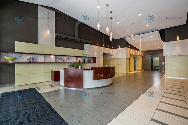 Building Photo - Modern 1 Bedroom 1 Bath Luxury Condo at Th...